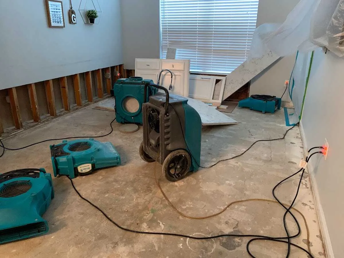 Dehumidifier in flood-cut room for Water Damage Restoration in Monroe